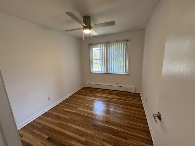 71 Schiller Rd, Fairfield, CT 06825 - unfurnished room featuring a baseboard heating unit, wood finished floors, a ceiling fan, and baseboards