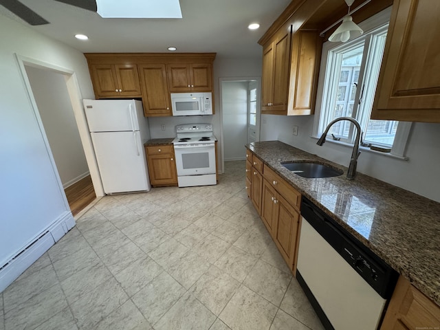 71 Schiller Rd, Fairfield, CT 06825 - kitchen featuring brown cabinetry, a sink, and white appliances