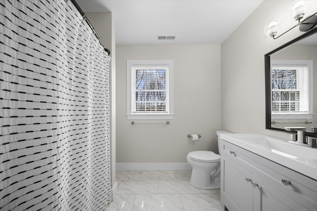 full bathroom with marble finish floor, toilet, vanity, baseboards, and visible vents