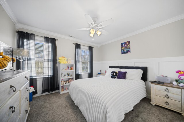 bedroom with visible vents, ornamental molding, and carpet flooring