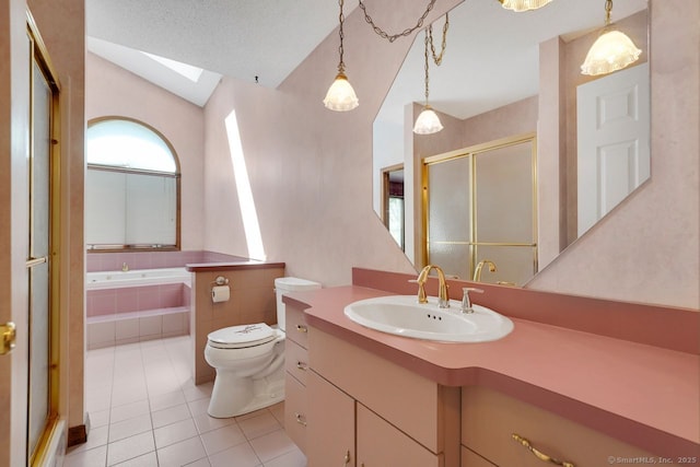 full bath with vaulted ceiling with skylight, a bath, tile patterned flooring, a shower stall, and toilet