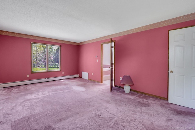 interior space featuring carpet floors, a textured ceiling, and baseboard heating