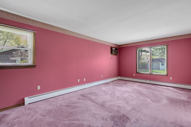 empty room featuring plenty of natural light, carpet flooring, baseboards, and a wall mounted air conditioner