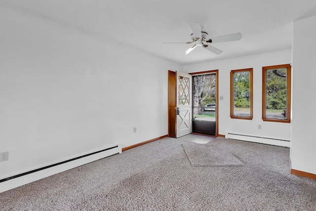 carpeted spare room featuring baseboards, a baseboard radiator, a baseboard heating unit, and ceiling fan