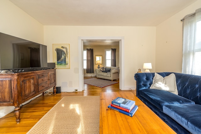 16 Pearl St, Groton, CT 06355 - living area with wood-type flooring and baseboards