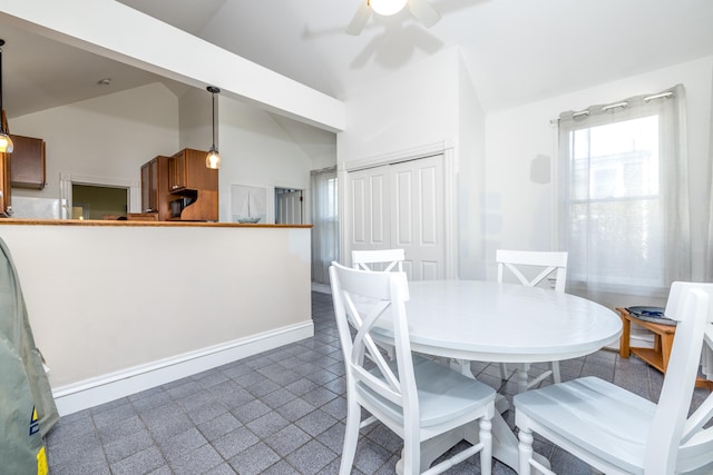 16 Pearl St, Groton, CT 06355 - dining area featuring a ceiling fan, baseboards, and vaulted ceiling