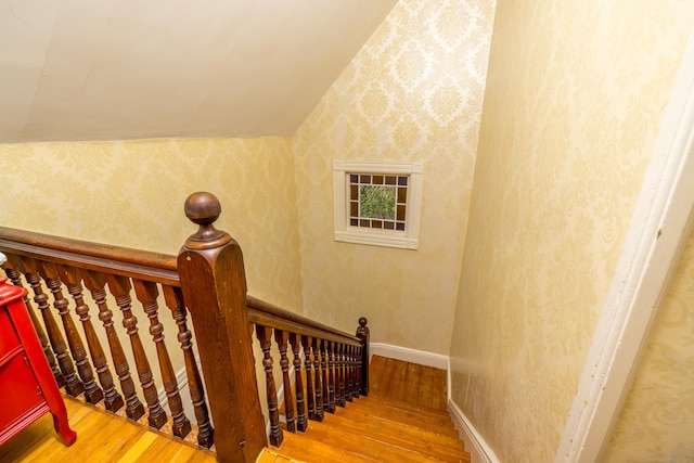 16 Pearl St, Groton, CT 06355 - stairs featuring lofted ceiling, wood finished floors, and wallpapered walls