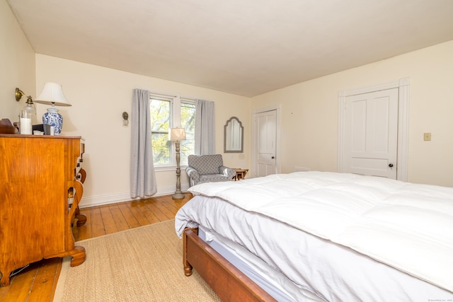 16 Pearl St, Groton, CT 06355 - bedroom with baseboards and wood-type flooring