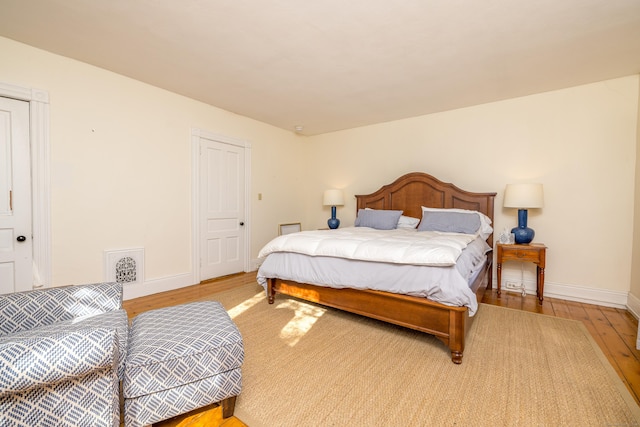 16 Pearl St, Groton, CT 06355 - bedroom with baseboards and light wood finished floors