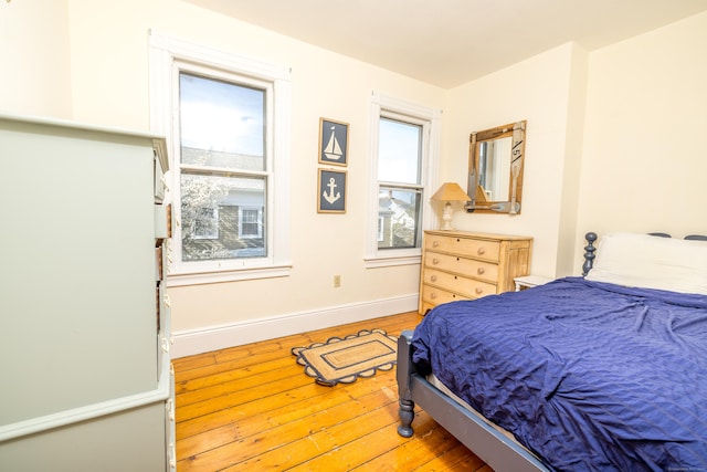 16 Pearl St, Groton, CT 06355 - bedroom featuring baseboards and light wood-style flooring