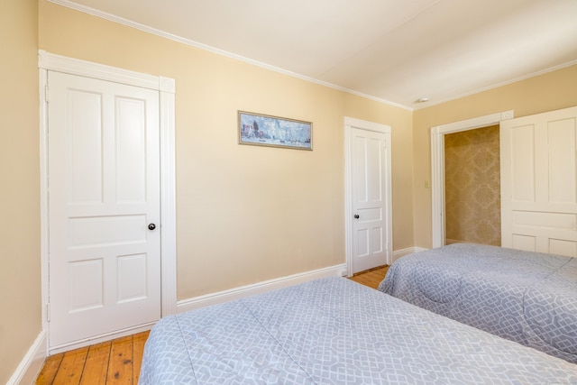 16 Pearl St, Groton, CT 06355 - bedroom featuring baseboards, ornamental molding, and light wood-type flooring