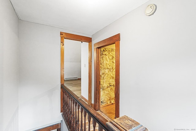 hallway featuring baseboard heating