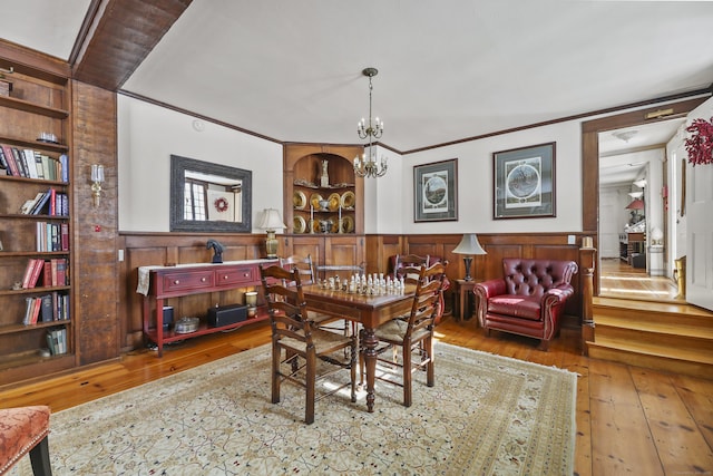 802 State Rd, Richmond, MA 01254 - dining area with hardwood / wood-style floors, wainscoting, and a chandelier