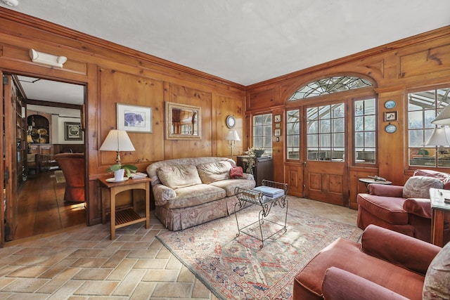 802 State Rd, Richmond, MA 01254 - living room featuring stone tile floors, crown molding, and wooden walls