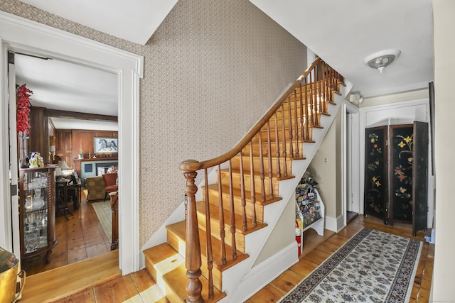802 State Rd, Richmond, MA 01254 - stairs featuring wood-type flooring, baseboards, and wallpapered walls