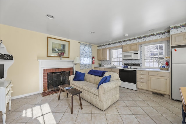 802 State Rd, Richmond, MA 01254 - kitchen with light tile patterned flooring, light brown cabinets, and white appliances