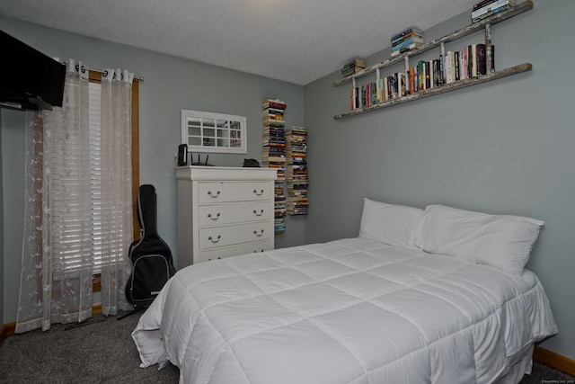 carpeted bedroom featuring baseboards