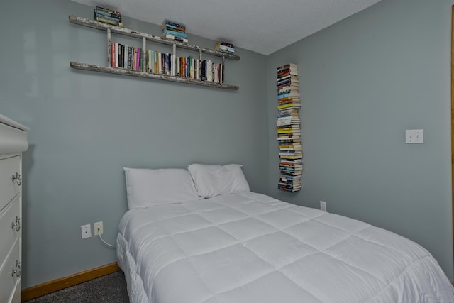 bedroom with baseboards