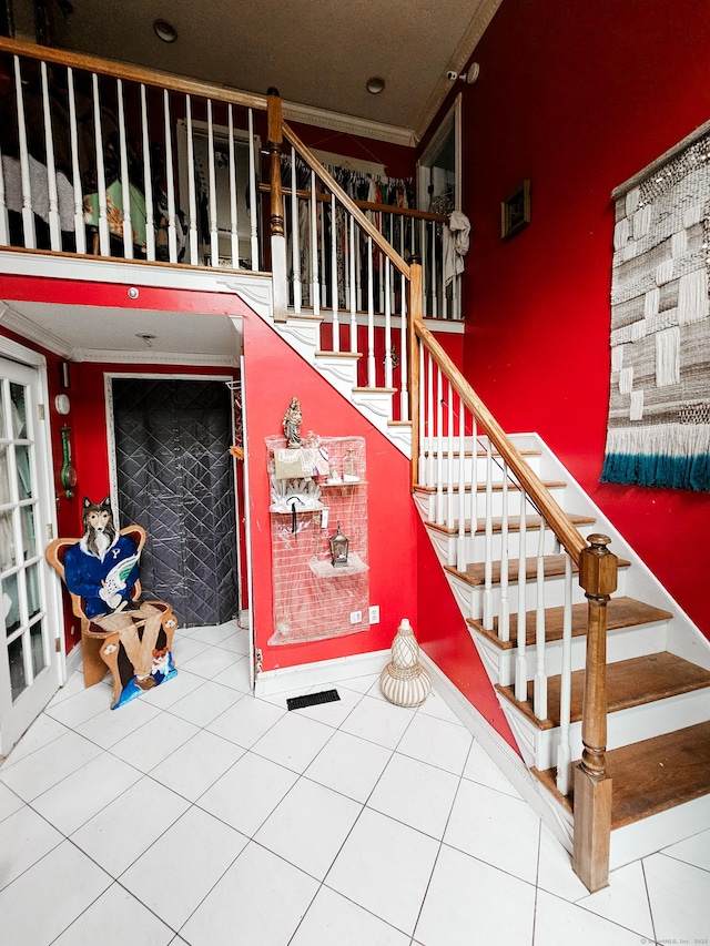935 Gaylord Mountain Rd, Hamden, CT 06518 - stairway with ornamental molding and tile patterned flooring