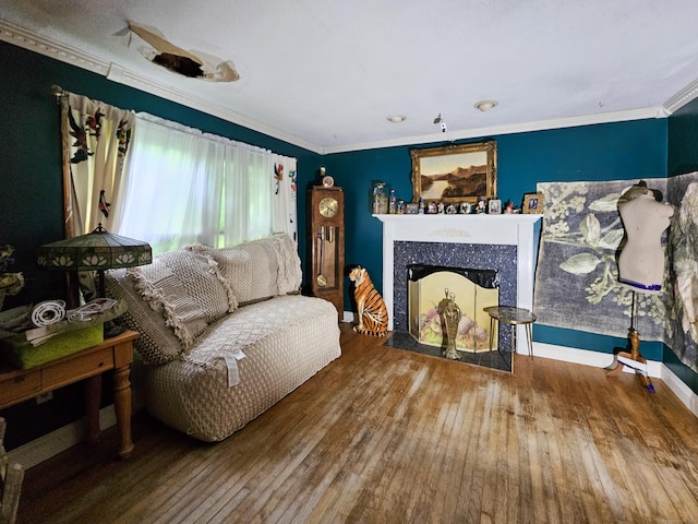935 Gaylord Mountain Rd, Hamden, CT 06518 - living room featuring wood-type flooring, a fireplace with flush hearth, ornamental molding, and baseboards