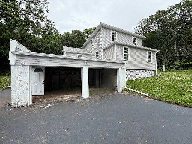 439 New Hanover Ave, Meriden, CT 06451 - view of home's exterior featuring a yard and asphalt driveway