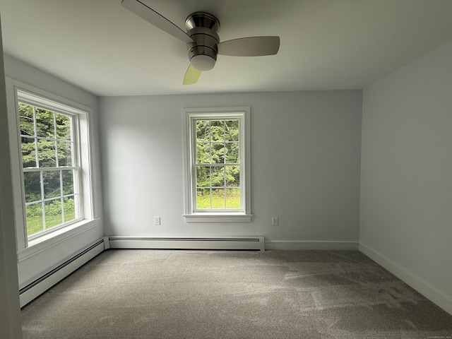 439 New Hanover Ave, Meriden, CT 06451 - carpeted spare room with healthy amount of natural light, ceiling fan, and a baseboard heating unit