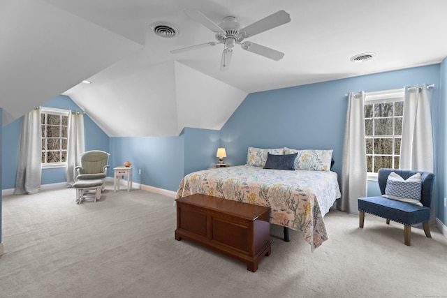carpeted bedroom with visible vents, ceiling fan, lofted ceiling, and baseboards