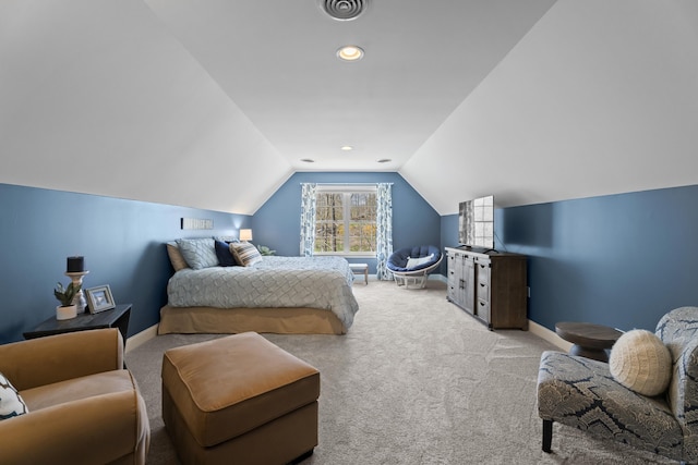 bedroom with visible vents, carpet flooring, vaulted ceiling, and baseboards