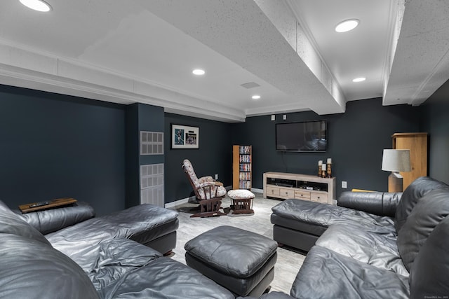 cinema room with baseboards and recessed lighting