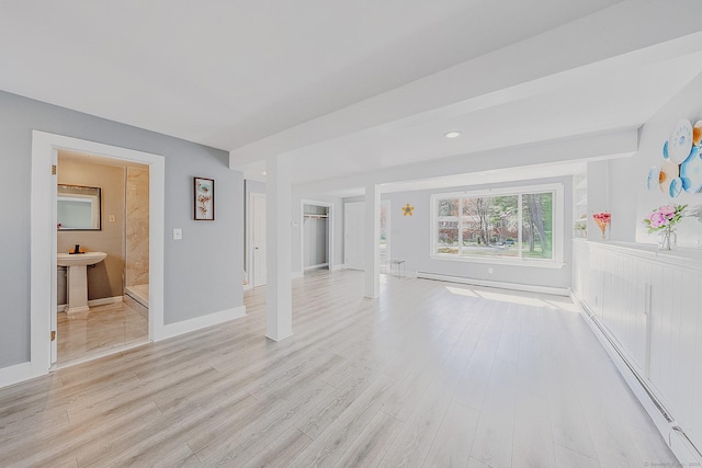 106 Lorraine Ter, Middletown, CT 06457 - unfurnished living room featuring baseboards and light wood-style flooring