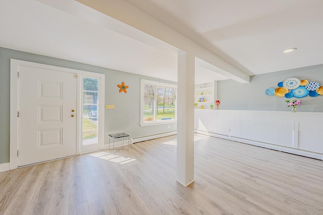 106 Lorraine Ter, Middletown, CT 06457 - entrance foyer with baseboard heating, baseboards, and wood finished floors