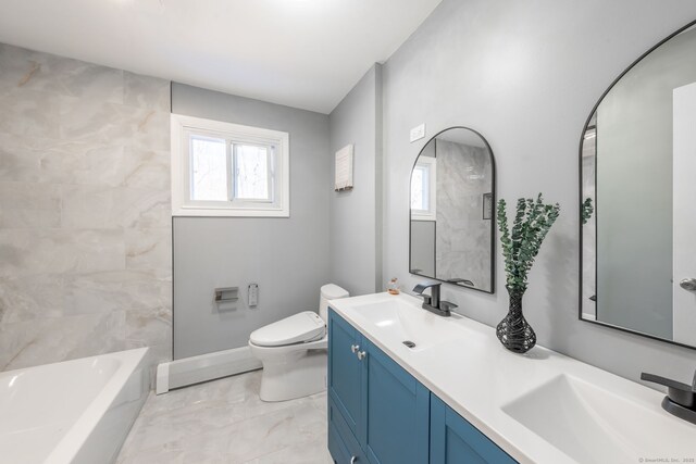 106 Lorraine Ter, Middletown, CT 06457 - bathroom featuring double vanity, toilet, marble finish floor, and a sink