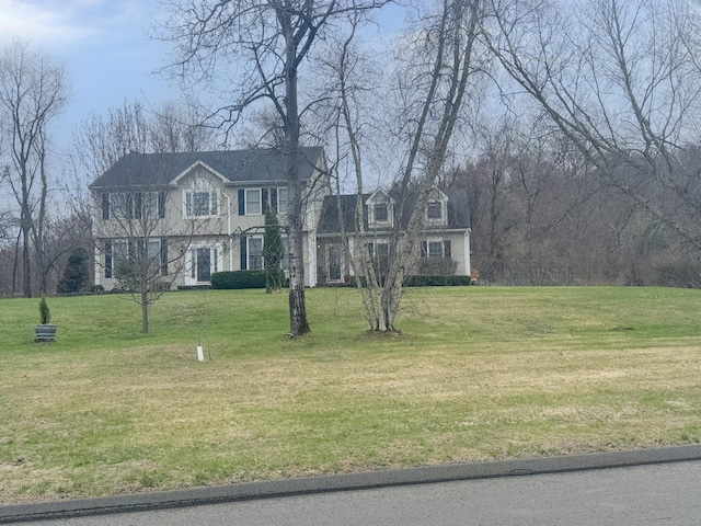 view of front facade with a front yard