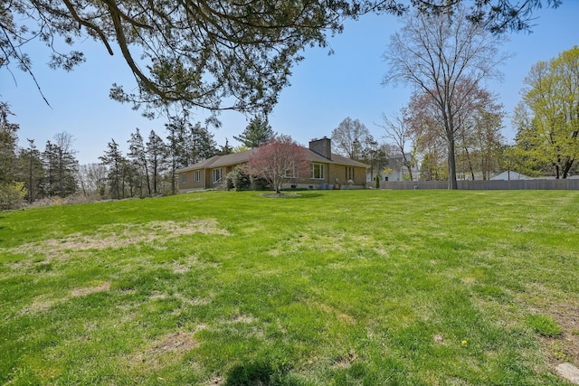 view of yard with fence