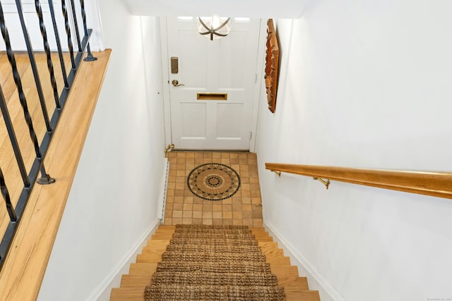 stairway with baseboards