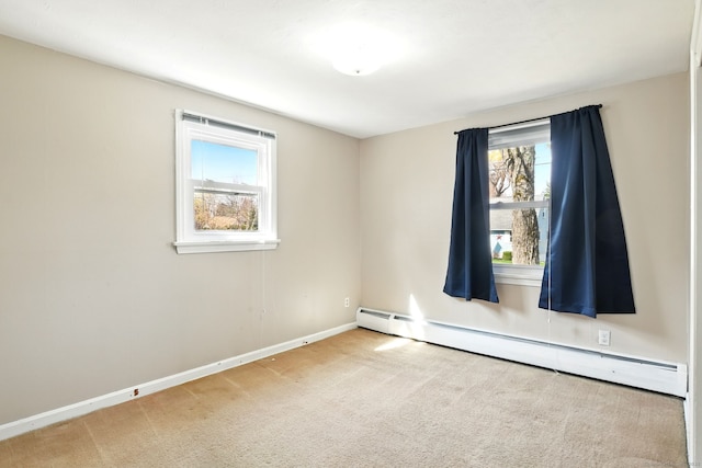 94 Maple Ridge Dr, Somers, CT 06071 - spare room featuring a baseboard heating unit, baseboards, and carpet