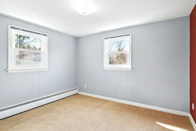 94 Maple Ridge Dr, Somers, CT 06071 - unfurnished room featuring plenty of natural light, baseboard heating, baseboards, and carpet