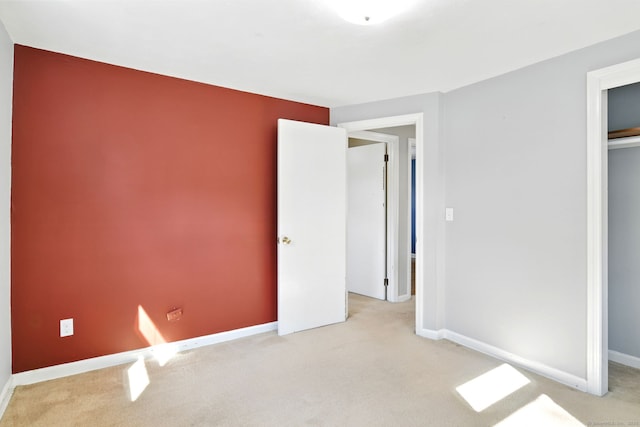 94 Maple Ridge Dr, Somers, CT 06071 - unfurnished bedroom featuring carpet floors, a closet, and baseboards