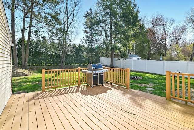 94 Maple Ridge Dr, Somers, CT 06071 - deck with a fenced backyard, a grill, and a yard