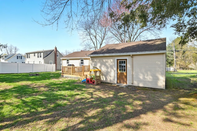 94 Maple Ridge Dr, Somers, CT 06071 - back of house featuring a yard, fence, and a deck