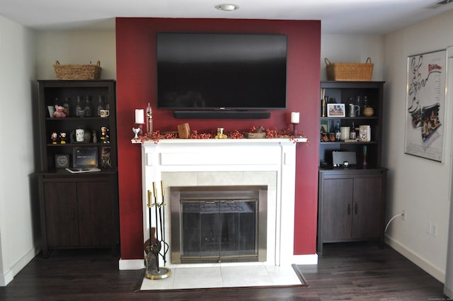 1 E Hayestown Rd Unit 142, Danbury, CT 06811 - living room with a tiled fireplace, baseboards, and wood finished floors