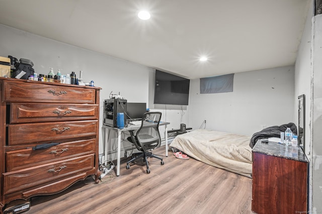 bedroom featuring recessed lighting and light wood-style flooring