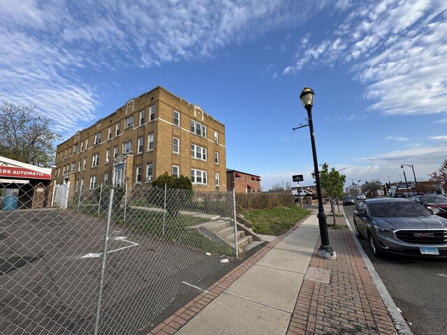 913 Wethersfield Ave, Hartford, CT 06114 - view of building exterior with fence