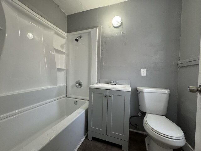 913 Wethersfield Ave, Hartford, CT 06114 - bathroom featuring toilet, vanity, wood finished floors, and shower / bathtub combination