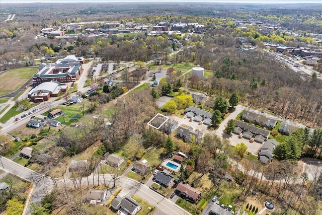 drone / aerial view with a view of trees