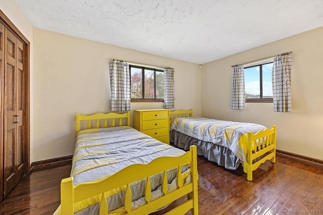 167 Arline Dr, Waterbury, CT 06705 - bedroom with multiple windows, hardwood / wood-style floors, and baseboards