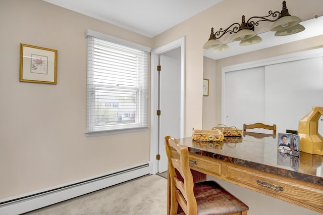 dining area featuring light colored carpet, plenty of natural light, and a baseboard heating unit