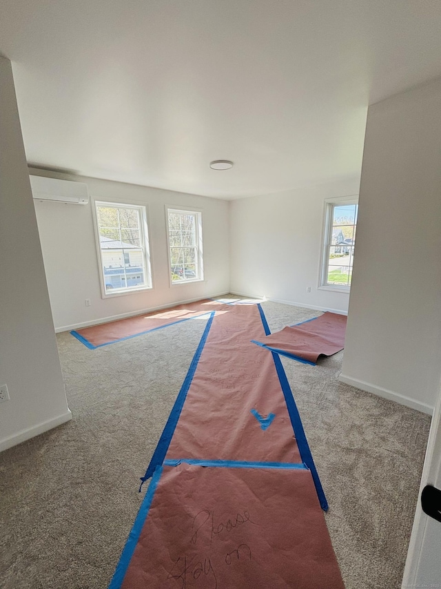 1 First St, Thompson, CT 06255 - rec room with carpet flooring, baseboards, and a wall mounted AC