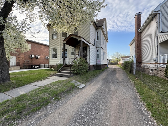 15 Eaton St, Hartford, CT 06114 - view of front of property featuring fence and cooling unit