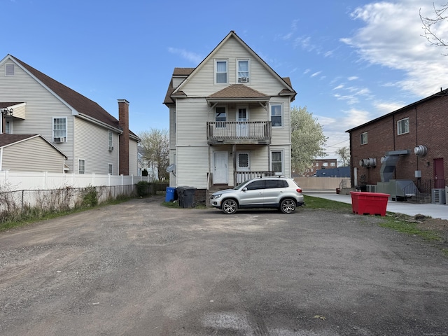 15 Eaton St, Hartford, CT 06114 - view of front facade featuring fence and a balcony
